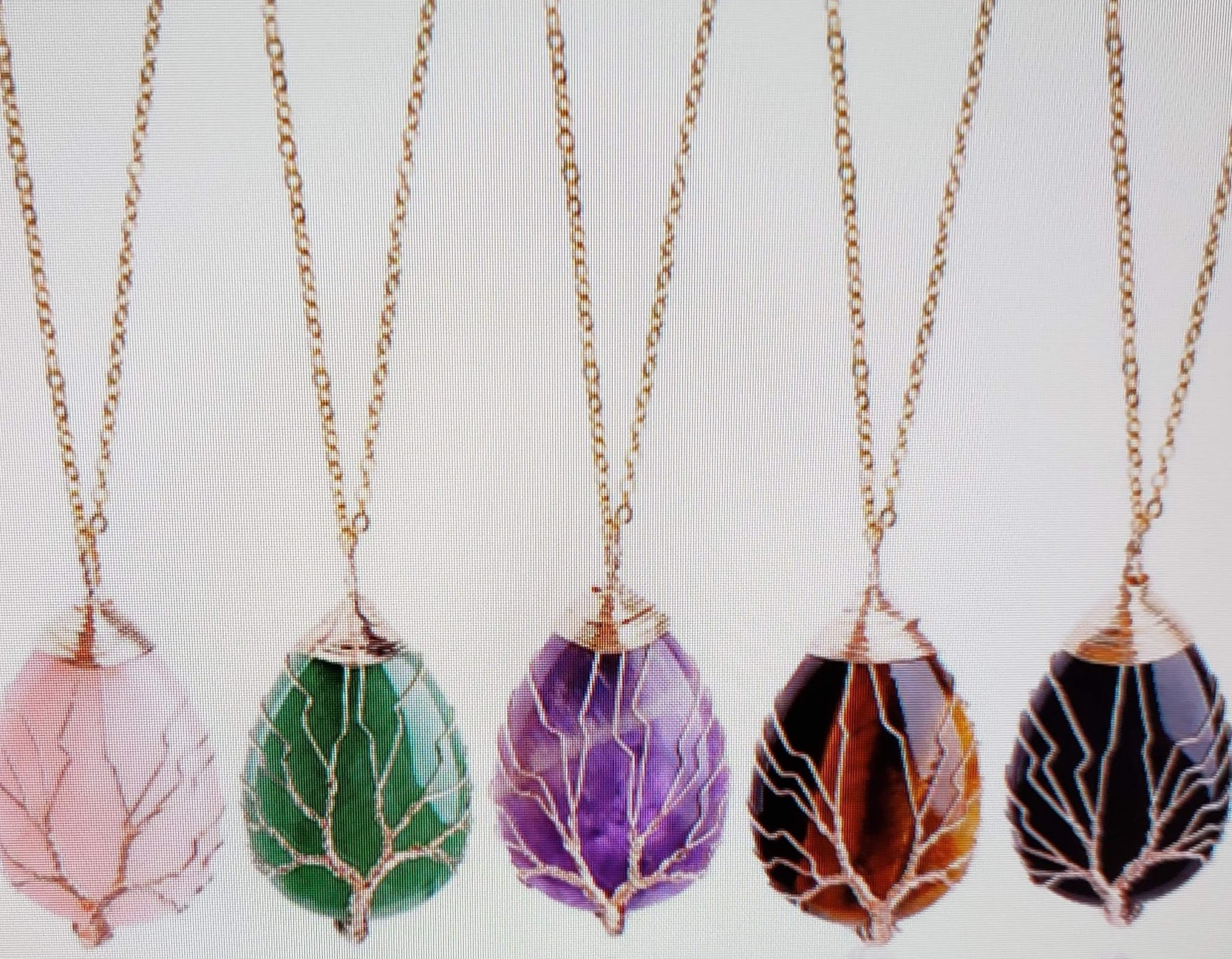 Handcrafted wire-wrapped pearl and stone pendant necklaces by Orillia Pearl Oyster Mama